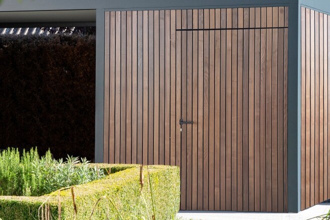 Carport with wooden storage